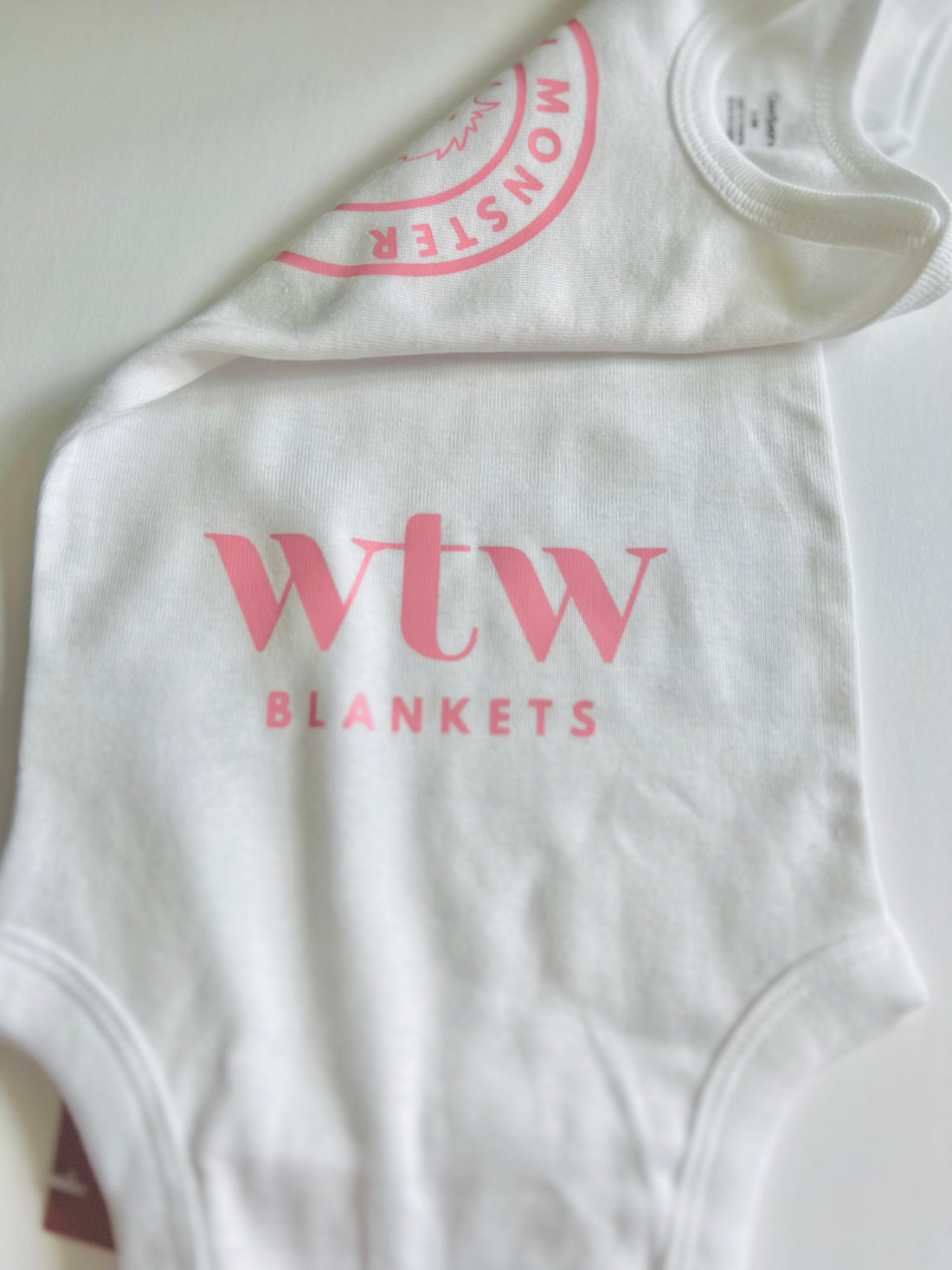 "Minky Monster" - white with pink logo -onesie