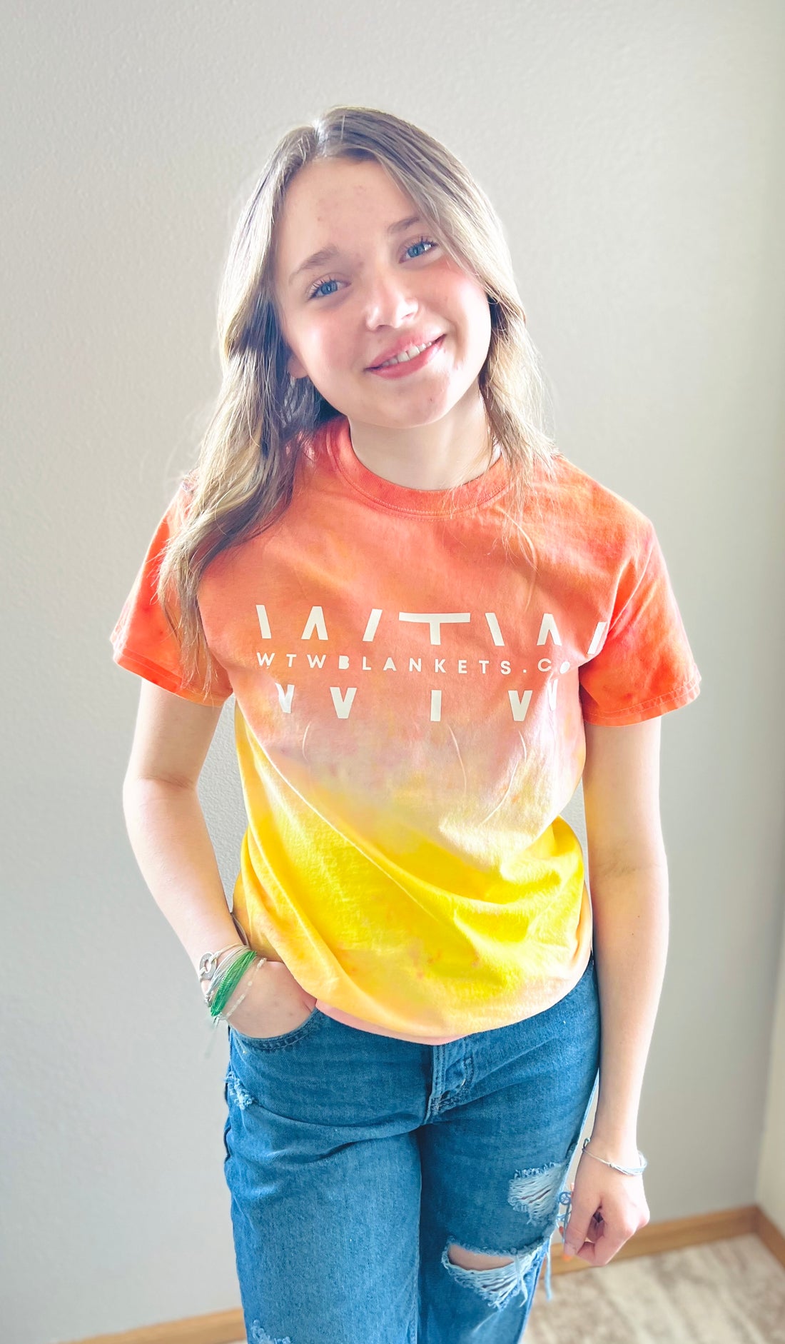 WTW yellow/orange tie-dye T-shirt with white vinyl